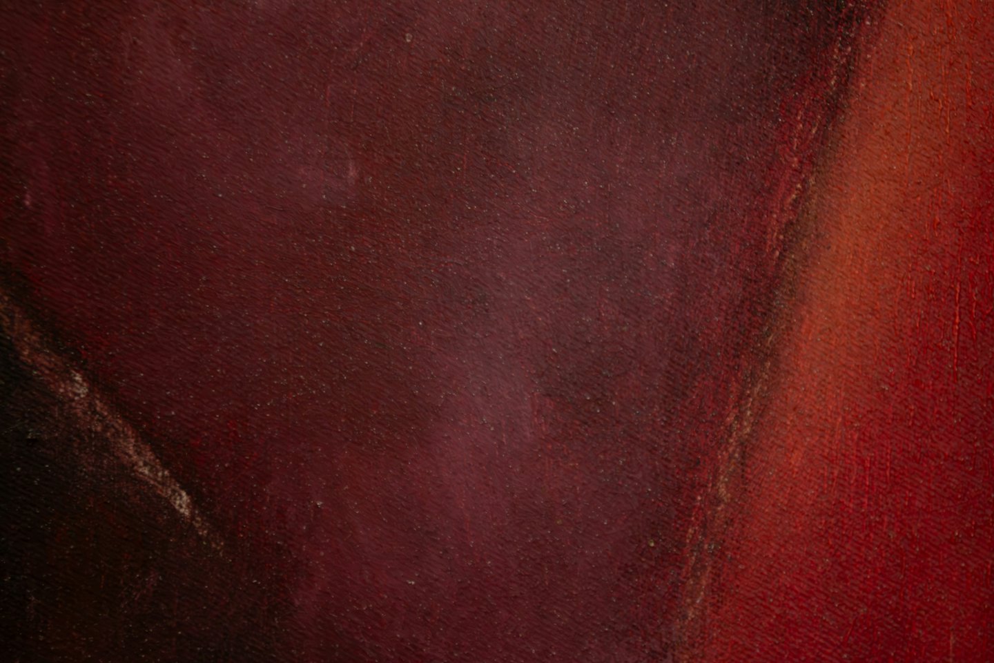 Tela testurizzata dipinta in tonalità di rosso intenso e marrone.